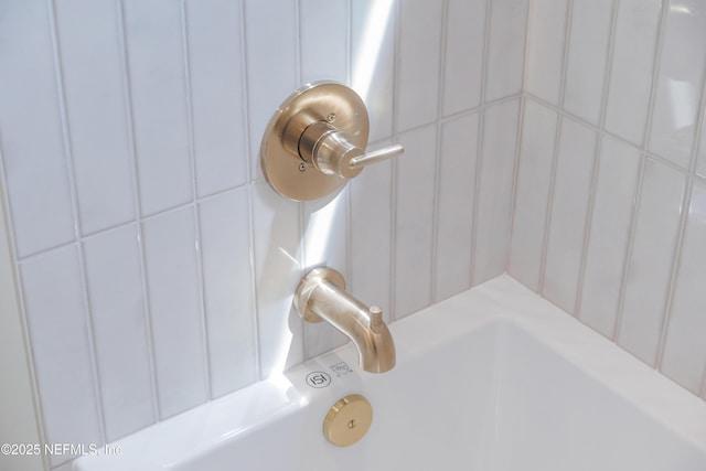 interior details featuring walk in shower