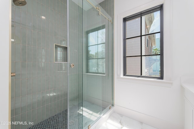 bathroom featuring a stall shower