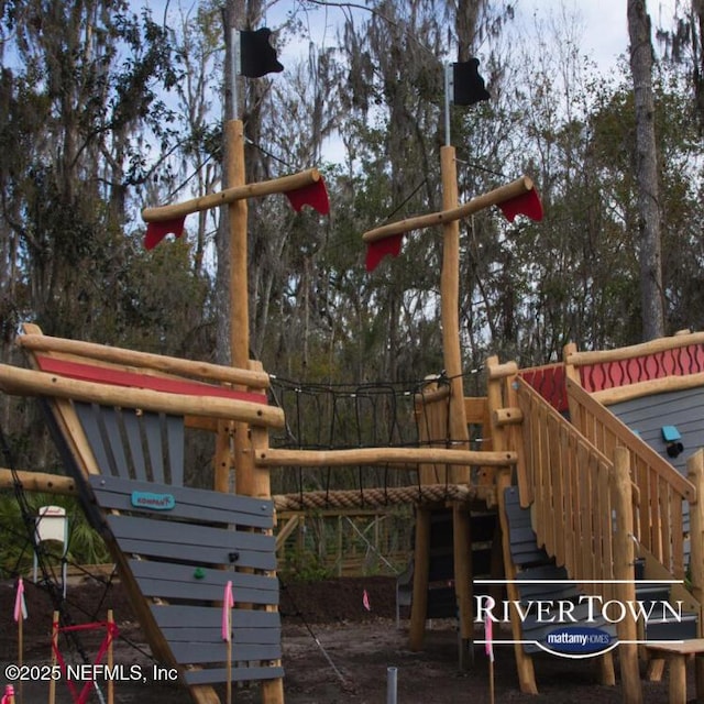 view of jungle gym featuring stairs