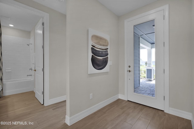 208 Curved Bay Trl, Ponte Vedra, FL 32081 - doorway with light wood-style floors and baseboards