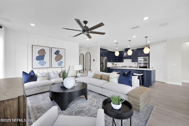 208 Curved Bay Trl, Ponte Vedra, FL 32081 - living room with ceiling fan, light wood finished floors, recessed lighting, and visible vents