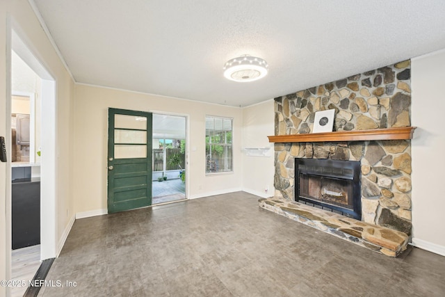7437 Ortega Hills Dr, Jacksonville, FL 32244 - unfurnished living room featuring a fireplace, baseboards, and a textured ceiling