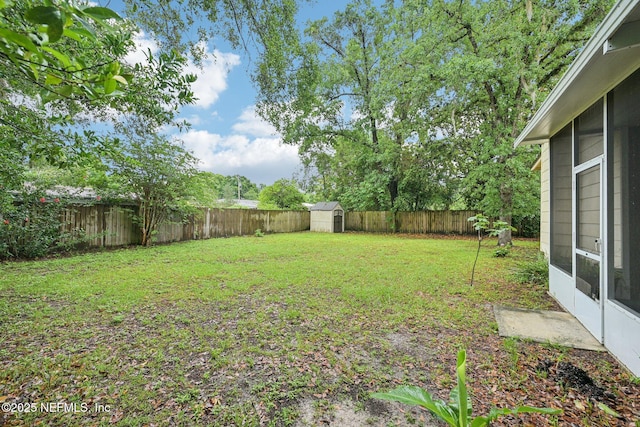 7437 Ortega Hills Dr, Jacksonville, FL 32244 - view of yard featuring a storage shed and an outbuilding