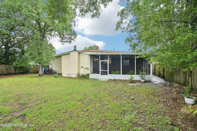 7437 Ortega Hills Dr, Jacksonville, FL 32244 - rear view of property with a sunroom