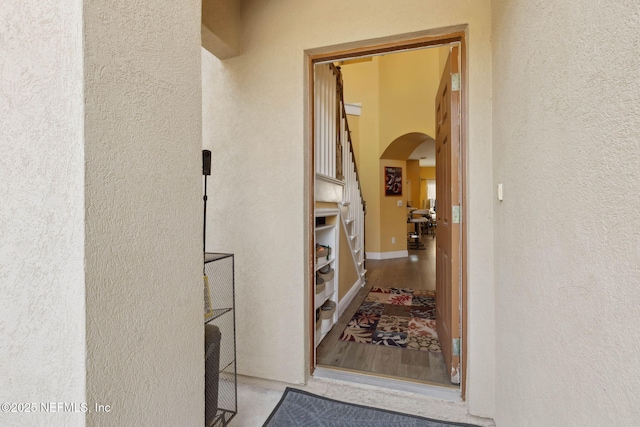 hallway with arched walkways