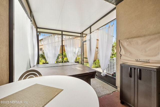 sunroom featuring a healthy amount of sunlight