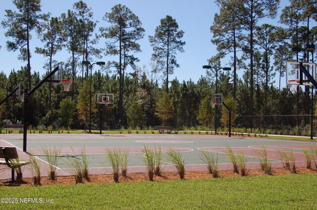 view of sport court featuring community basketball court