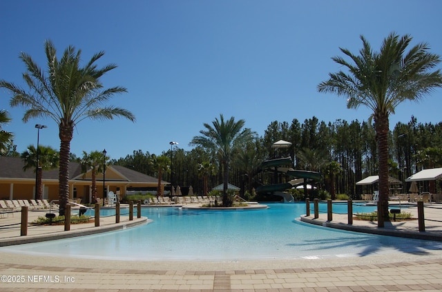 community pool with a water slide