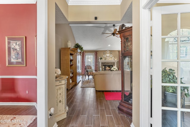 10919 Houndwell Way, Jacksonville, FL 32225 - hall with baseboards, a textured ceiling, and dark wood finished floors
