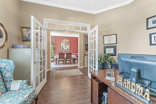 10919 Houndwell Way, Jacksonville, FL 32225 - office with french doors, wood finished floors, baseboards, an inviting chandelier, and ornamental molding