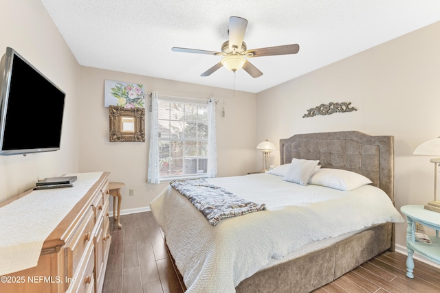 10919 Houndwell Way, Jacksonville, FL 32225 - bedroom featuring baseboards, a ceiling fan, and dark wood finished floors