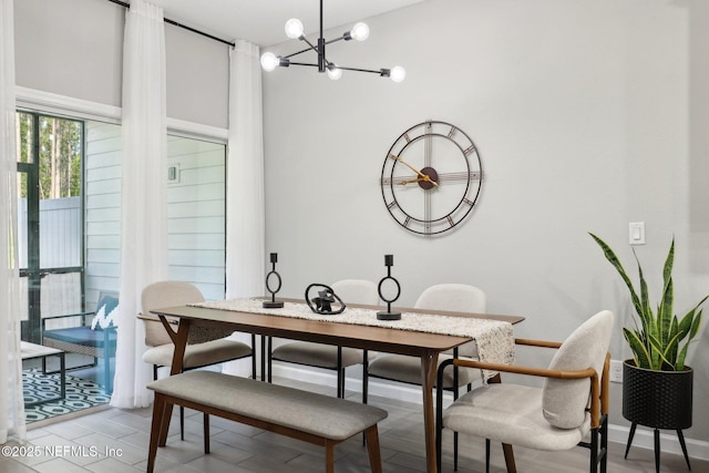 dining area featuring a chandelier