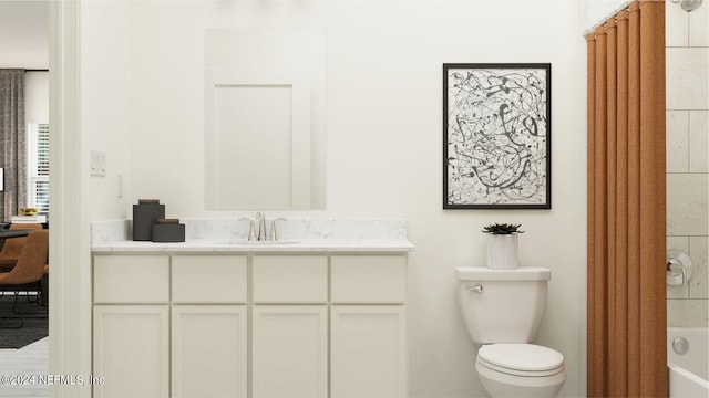 bathroom with vanity and toilet