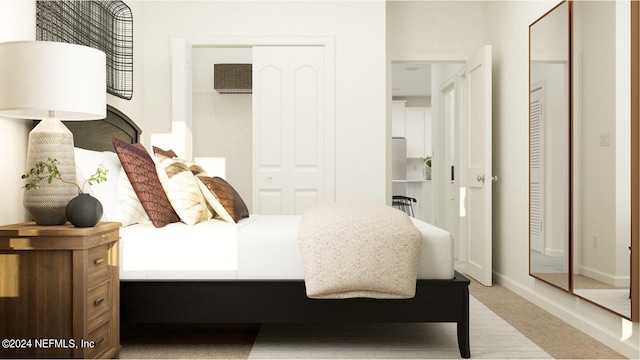 bedroom with a closet, baseboards, an AC wall unit, and light colored carpet