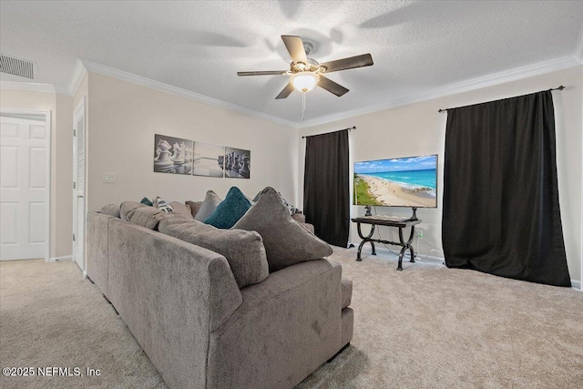 living room featuring visible vents, carpet flooring, ceiling fan, and ornamental molding