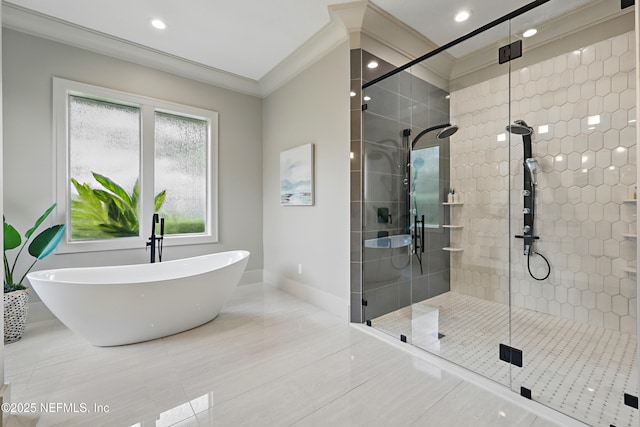 full bath featuring a freestanding bath, baseboards, a stall shower, and recessed lighting