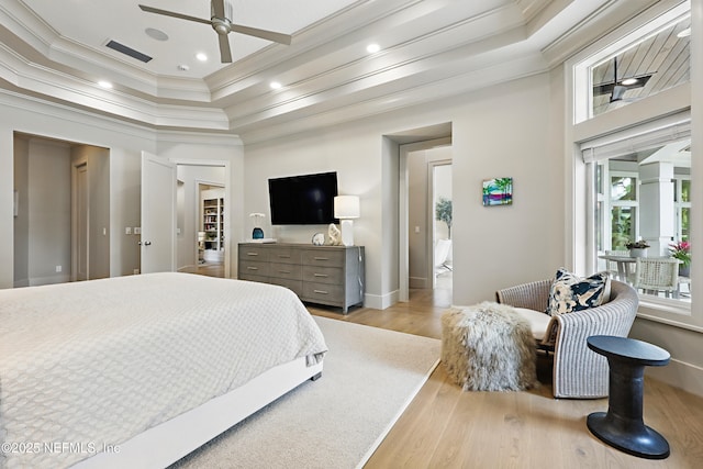 bedroom featuring crown molding, ceiling fan, light wood-style flooring, recessed lighting, and baseboards