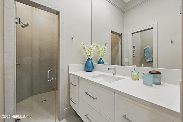 bathroom featuring vanity and a stall shower
