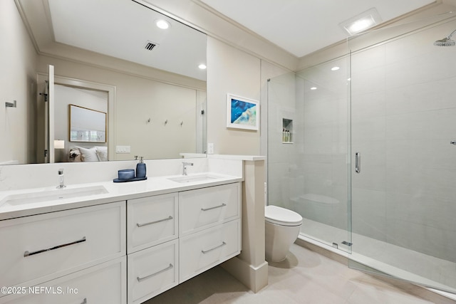 full bath with visible vents, a sink, connected bathroom, and a stall shower