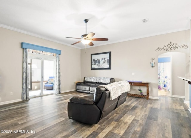 3237 Deer Creek Dr, Middleburg, FL 32068 - living room with wood finished floors, a ceiling fan, crown molding, and arched walkways