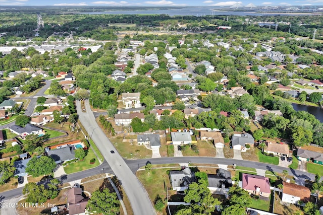 birds eye view of property with a residential view