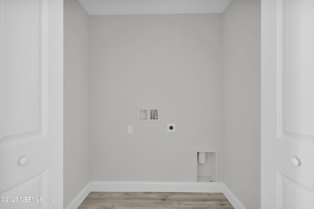 laundry room with baseboards, electric dryer hookup, washer hookup, and light wood finished floors