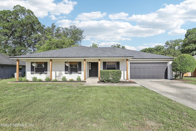 12548 Dunraven Trl, Jacksonville, FL 32223 - ranch-style home with brick siding, concrete driveway, an attached garage, and a front lawn