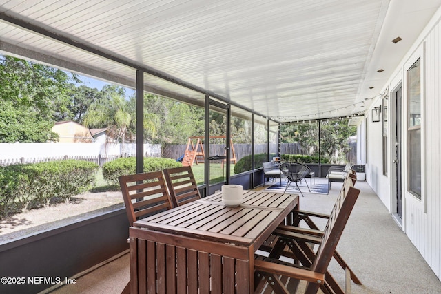 12548 Dunraven Trl, Jacksonville, FL 32223 - sunroom / solarium featuring outdoor dining area