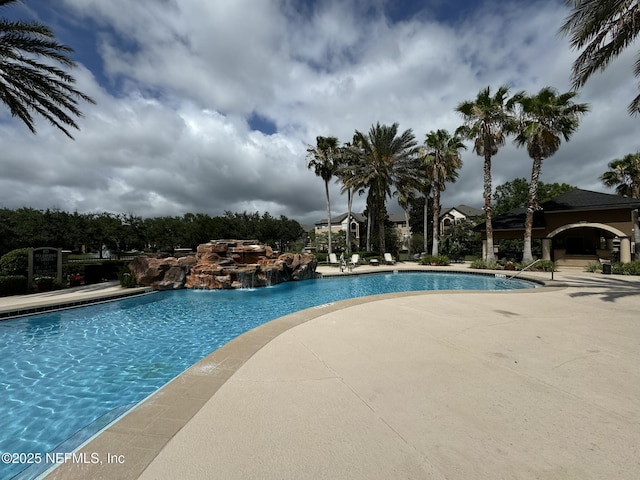 community pool featuring a patio