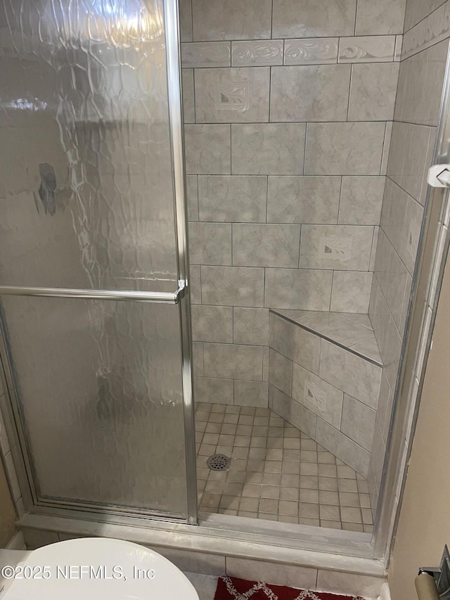 6938 Corkwood Rd, Jacksonville, FL 32277 - bathroom featuring a shower stall and toilet