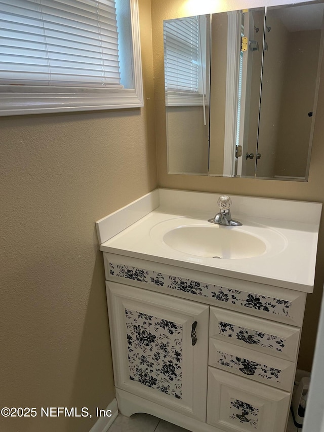 6938 Corkwood Rd, Jacksonville, FL 32277 - bathroom with vanity and plenty of natural light