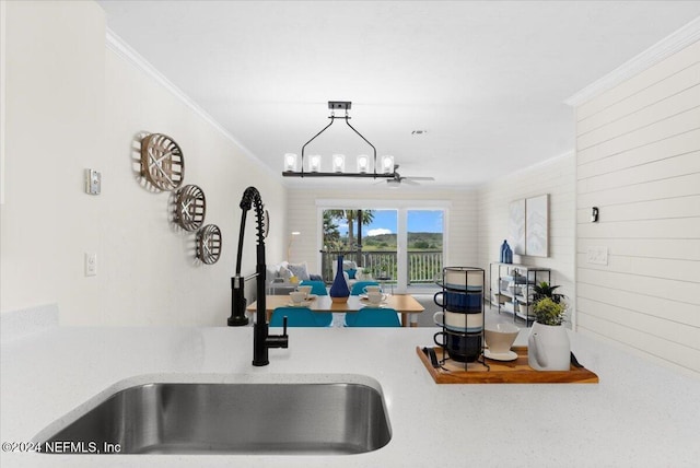 3385 Coastal Hwy Unit 23, Saint Augustine, FL 32084 - interior details featuring ceiling fan, ornamental molding, and a sink