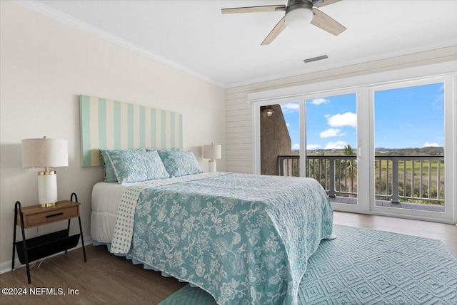 3385 Coastal Hwy Unit 23, Saint Augustine, FL 32084 - bedroom with crown molding, access to outside, wood finished floors, and visible vents
