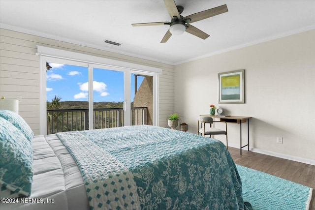 3385 Coastal Hwy Unit 23, Saint Augustine, FL 32084 - bedroom with visible vents, ornamental molding, wood finished floors, baseboards, and access to outside