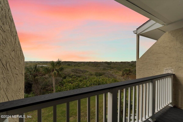 3385 Coastal Hwy Unit 23, Saint Augustine, FL 32084 - view of balcony at dusk