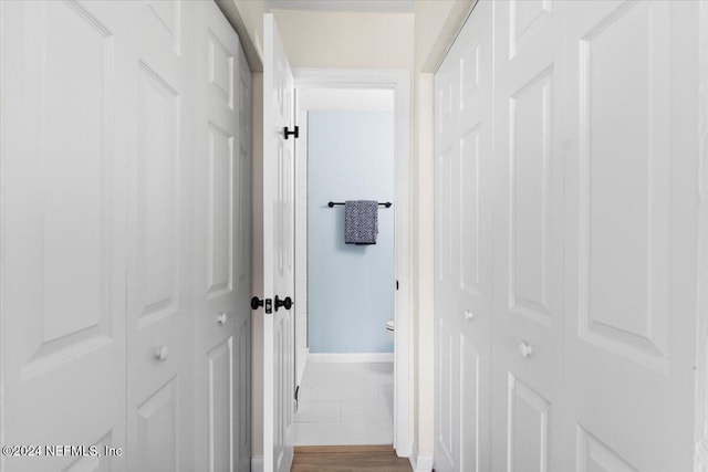 3385 Coastal Hwy Unit 23, Saint Augustine, FL 32084 - hallway with baseboards and wood finished floors