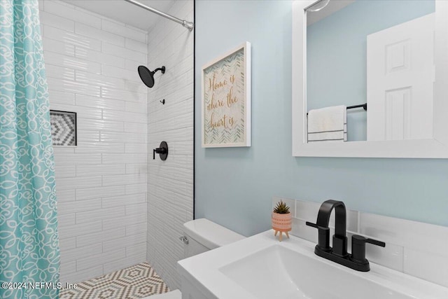 3385 Coastal Hwy Unit 23, Saint Augustine, FL 32084 - full bath with vanity, a tile shower, and toilet