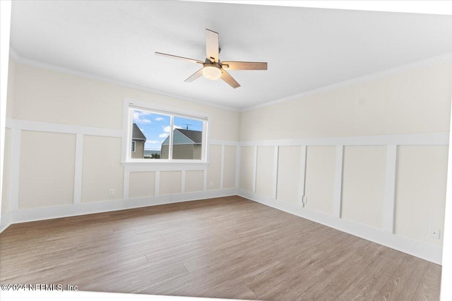 3385 Coastal Hwy Unit 23, Saint Augustine, FL 32084 - unfurnished room featuring crown molding, ceiling fan, and wood finished floors