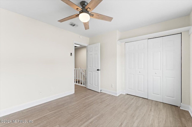 3385 Coastal Hwy Unit 23, Saint Augustine, FL 32084 - unfurnished bedroom featuring baseboards, a closet, wood finished floors, and visible vents
