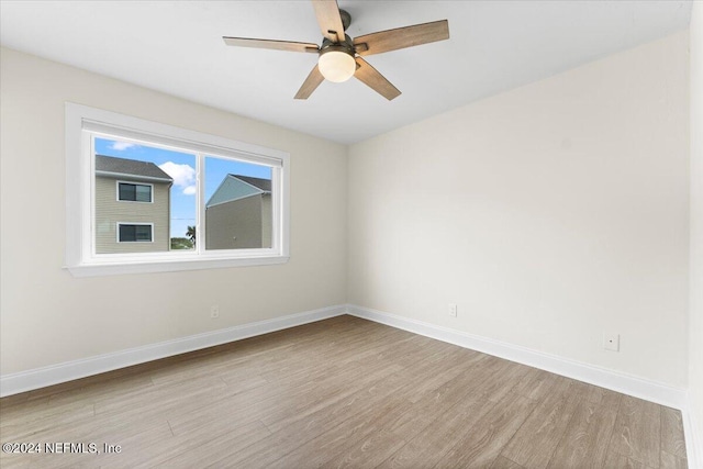 3385 Coastal Hwy Unit 23, Saint Augustine, FL 32084 - spare room with baseboards, ceiling fan, and wood finished floors