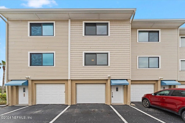 3385 Coastal Hwy Unit 23, Saint Augustine, FL 32084 - view of front facade featuring an attached garage