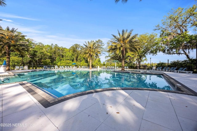 pool featuring a patio