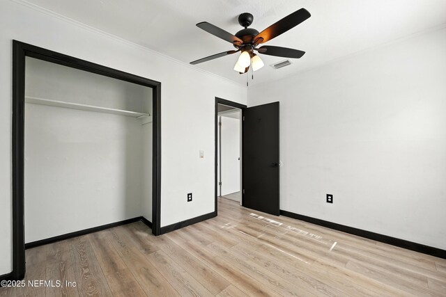 367 Orange Ave, Baldwin, FL 32234 - unfurnished bedroom featuring a ceiling fan, visible vents, baseboards, a closet, and light wood finished floors