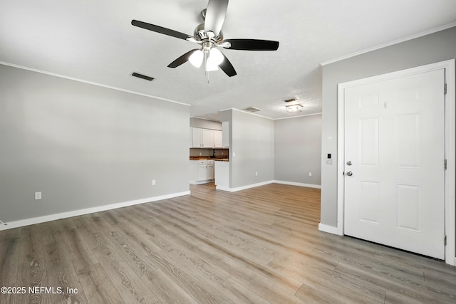 367 Orange Ave, Baldwin, FL 32234 - unfurnished living room with visible vents, ornamental molding, baseboards, light wood-type flooring, and a ceiling fan