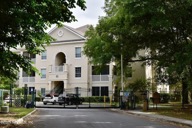 view of building exterior featuring fence