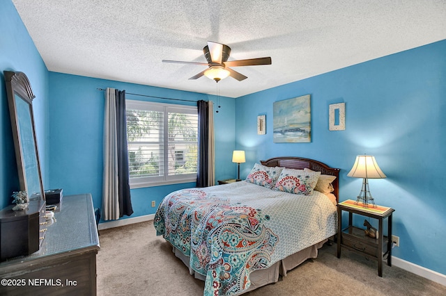 50 Jefferson Ave, Ponte Vedra Beach, FL 32082 - bedroom featuring baseboards, carpet flooring, a ceiling fan, and a textured ceiling