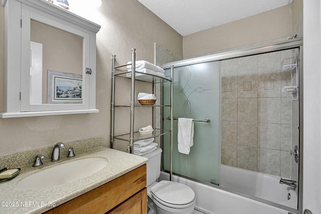 50 Jefferson Ave, Ponte Vedra Beach, FL 32082 - bathroom with toilet, vanity, a textured ceiling, a textured wall, and shower / bath combination with glass door