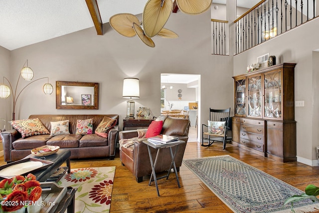 50 Jefferson Ave, Ponte Vedra Beach, FL 32082 - living area featuring beamed ceiling, wood-type flooring, and high vaulted ceiling