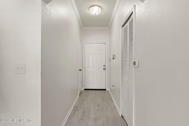 10961 Burnt Mill Rd Unit 318, Jacksonville, FL 32256 - hall with baseboards, ornamental molding, and light wood finished floors