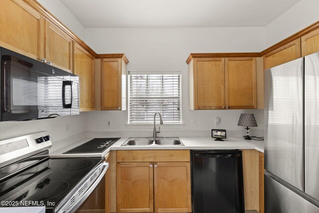 10961 Burnt Mill Rd Unit 318, Jacksonville, FL 32256 - kitchen with a sink, light countertops, and stainless steel appliances